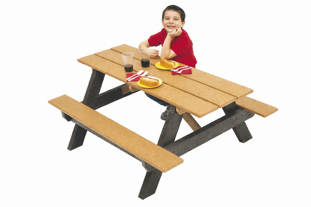 Preschool-aged child enjoying lunch at a compact recycled plastic kids picnic table with attached benches sized for small children.